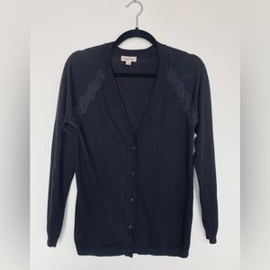 Black women’s v-neck cardigan with lace shoulder details size S